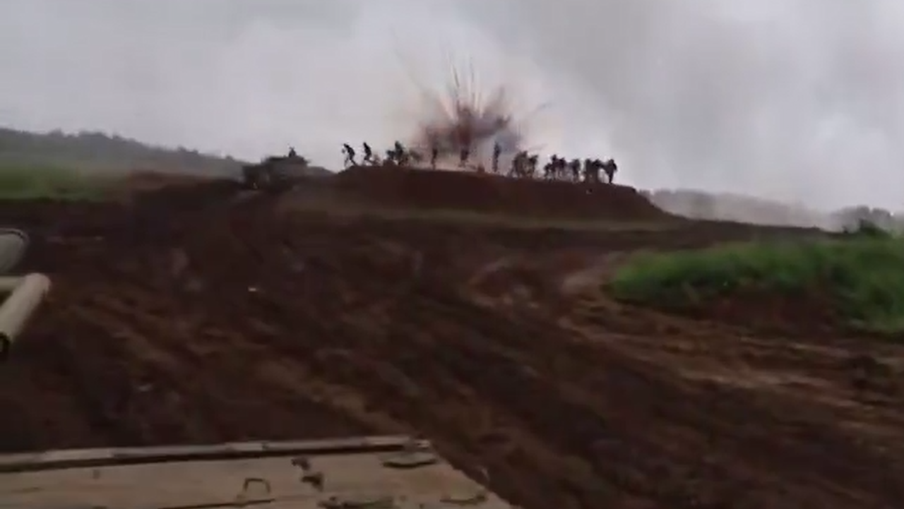 Chinese IFV Launches Smoke at Spectators
